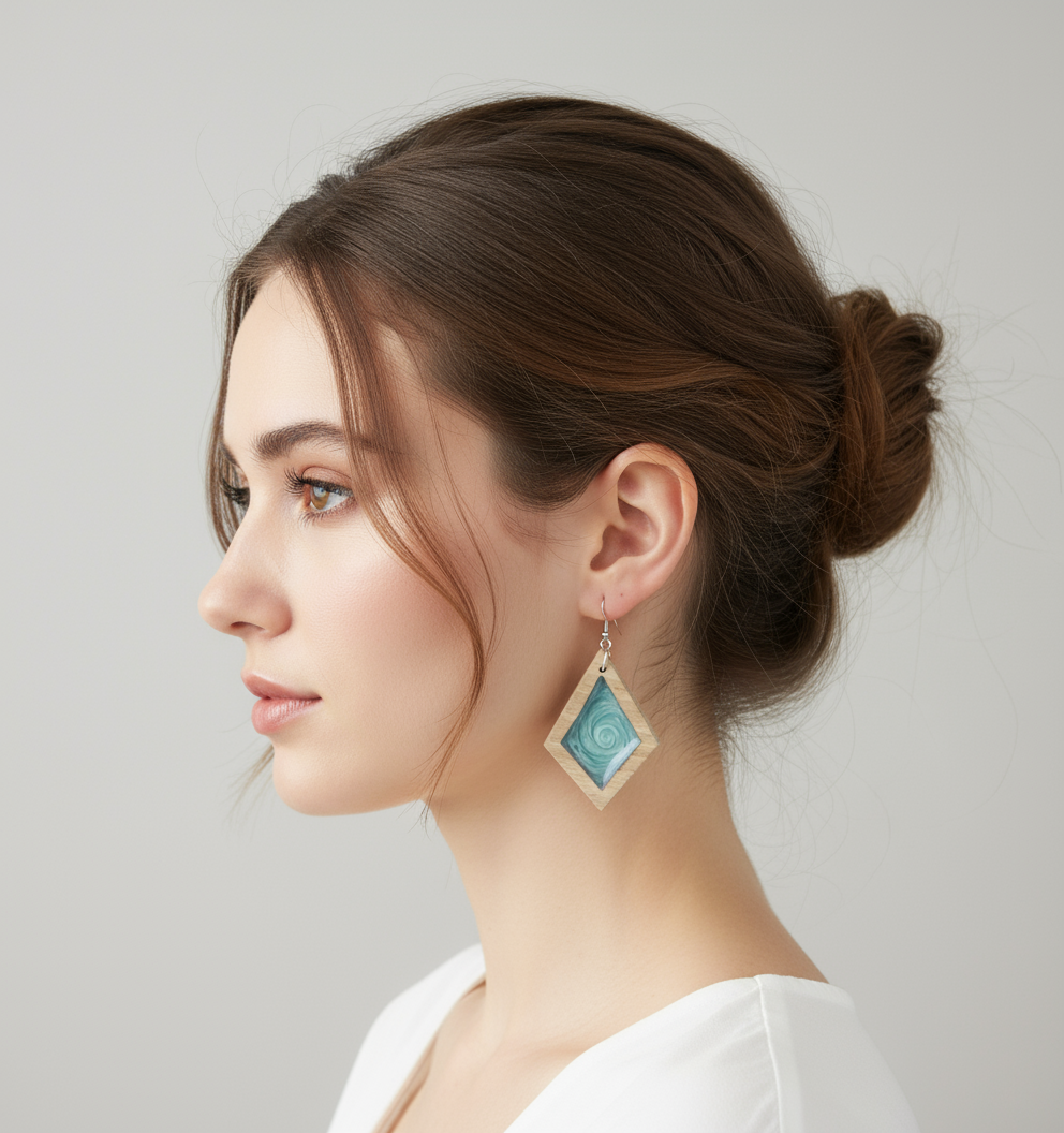 Woman wearing Turquoise earrings with a neutral background